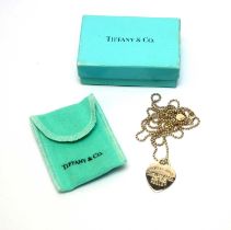 A Tiffany & Co silver pendant on chain