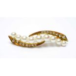 A cultured pearl and diamond brooch