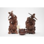 A pair of Japanese carved root wood figures of men and another