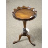 A Georgian style mahogany tripod wine table