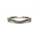 A diamond and 18ct white gold half eternity ring by Jenny Packham,