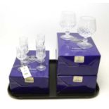 A set of six crystal port glasses; together with four brandy glasses