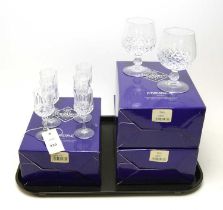 A set of six crystal port glasses; together with four brandy glasses