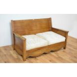 A contemporary hardwood sofa