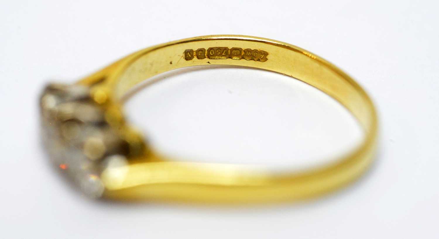 A 19th Century child's ring; and a diamond three stone ring - Image 4 of 4