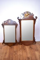 A Georgian style wall mirror with another