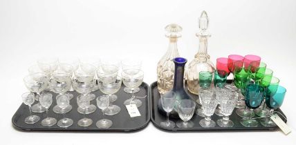 A collection of etched and other glassware