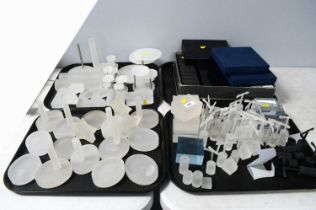 A collection of frosted glass jewellery display stands