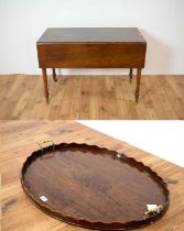A 19th Century mahogany Pembroke table / An early 20th Century mahogany two handled tray