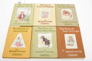 A collection of Beatrix Potter books.