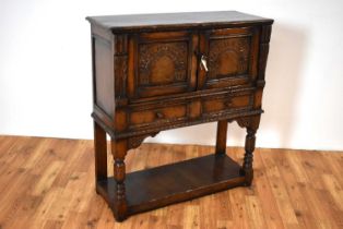 Attributed to Titchmarsh & Goodwin: a Jacobean Revival oak buffet