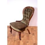 A Victorian mahogany balloon back easy chair,