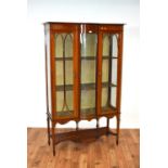 An Edwardian mahogany china display cabinet