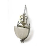An early 20th Century white metal wall sconce