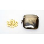 A 9ct gold "Ready and Reliable" school prize badge, and a George V silver vesta case