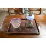 An Oriental tea tray; and an oil lamp