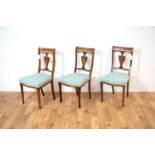A set of three Edwardian inlaid walnut chairs together with a reproduction mahogany coffee table