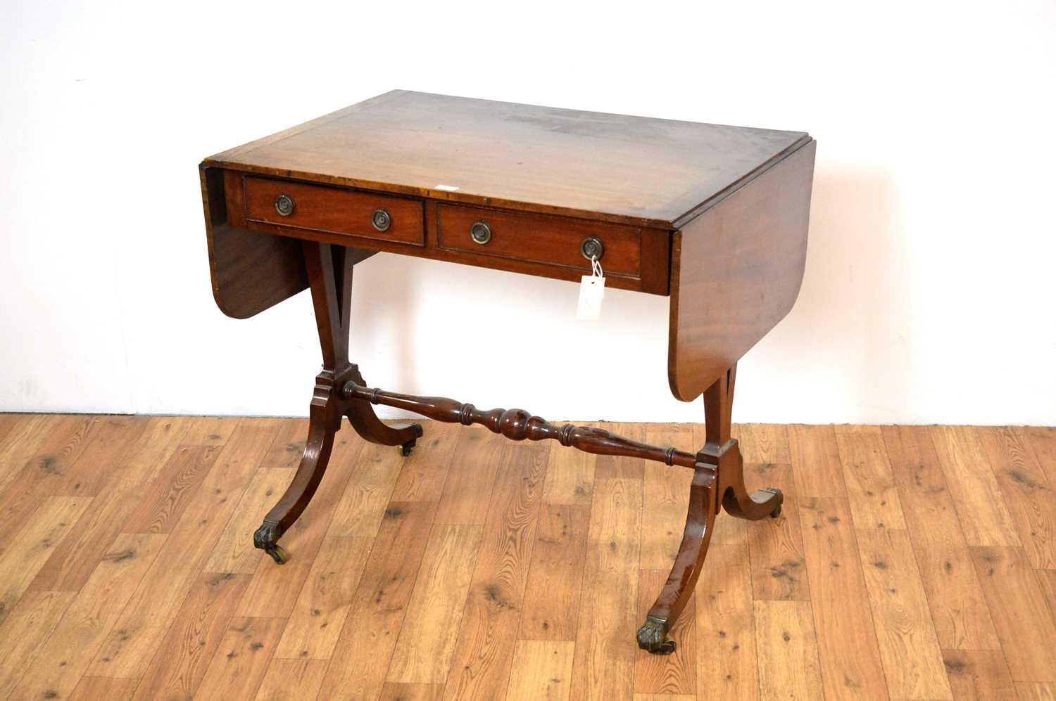 A 20th Century mahogany sofa table
