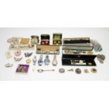 A selection of vintage costume jewellery, wristwatches, and coins