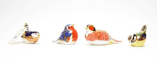 A collection of Royal Crown Derby ceramic bird paperweights