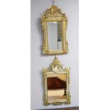 A modern carved gilt and polychrome wall mirror in the French taste