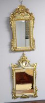 A modern carved gilt and polychrome wall mirror in the French taste