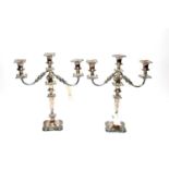 A pair of Victorian silver plated twin branch candelabra