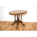 A Victorian burr walnut oval centre table
