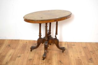 A Victorian burr walnut oval centre table