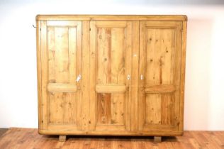 A 20th Century pine triple wardrobe