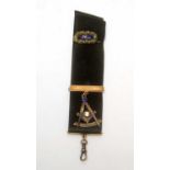 A masonic fob pendant, and a gold, enamel and turquoise brooch,