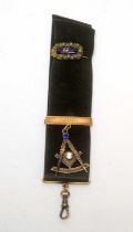 A masonic fob pendant, and a gold, enamel and turquoise brooch,