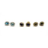 Three pairs of blue stone and white stone cluster earrings,