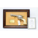 A Franklin Mint 'The John Wayne Western Commemorative .45' model revolver