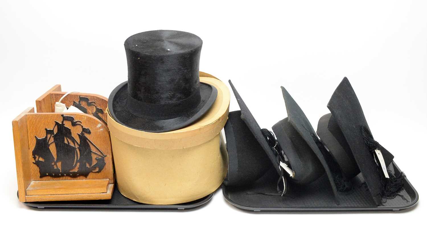 A gentleman’s black silk top hat, by Lincoln Bennet & Co