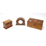 An Edwardian inlaid walnut mantel clock; and two boxes