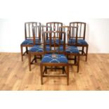 A set of six early 20th-century oak dining chairs