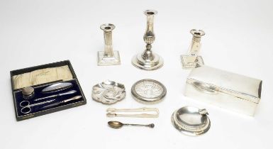 A selection of Edwardian silver, including a pair of columnar candlesticks