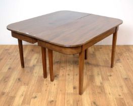 A mahogany 'D' end extendable dining table