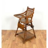 An Edwardian oak metamorphic childrens high chair