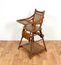 An Edwardian oak metamorphic childrens high chair