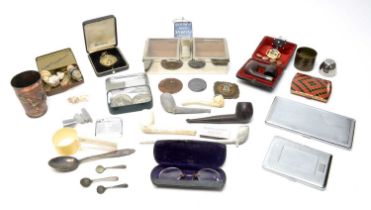 A collection of pipes, cigarette boxes and other ephemera