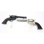 Two Colt Single Action Army .45 replica model revolvers.