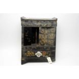 An oriental black lacquered table top chest