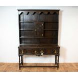 A Jacobean revival oak kitchen dresser