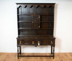 A Jacobean revival oak kitchen dresser