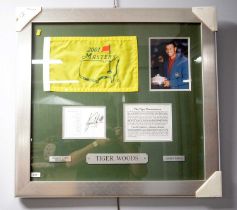 A Tiger Woods signed photograph montage.