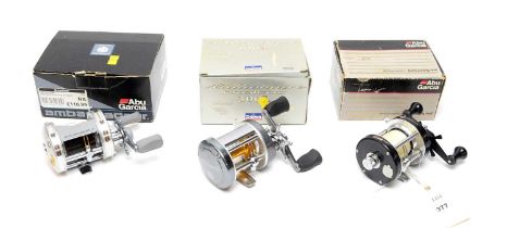 A selection of three spinning reels