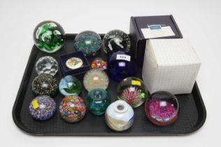 A collection of glass paperweights; and other items