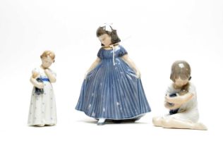 A collection of three Royal Copenhagen decorative ceramic figures